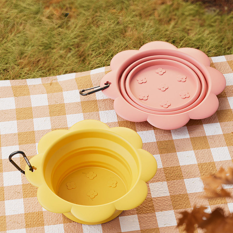 Foldable dog travel bowl shown collapsed and open